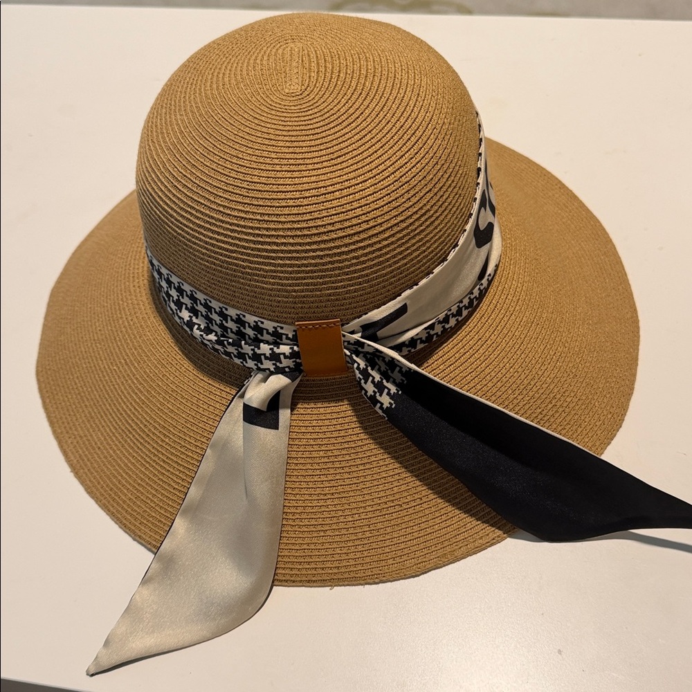 Elegant Tan Wide-Brim Hat with Black and White Scarf